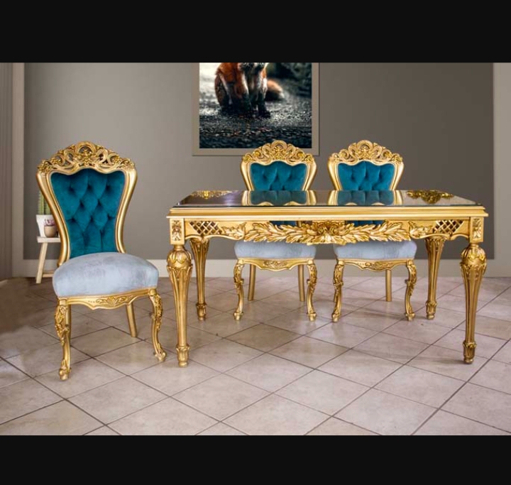 Opulent gold antique dining table set