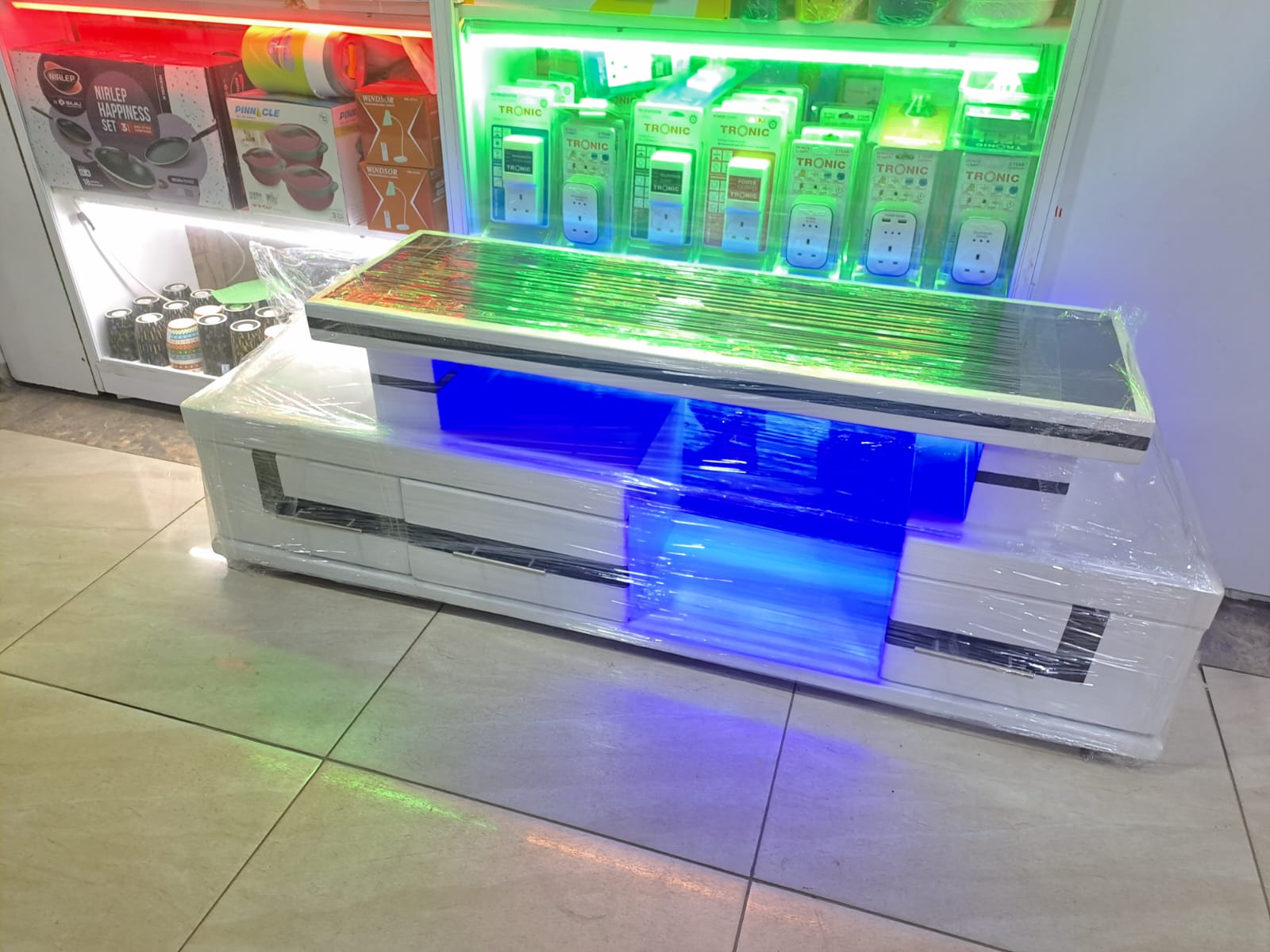 TV STAND WITH LED LIGHTS FITTED SUPPORT UPTO 50 INCH TV SIZE WITH DRAWERS.